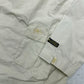 Reebok Windbreaker creme Tasche und GL Patch Detail