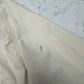 Reebok Windbreaker creme Zustand Detail grauer Reibefleck am Ärmel
