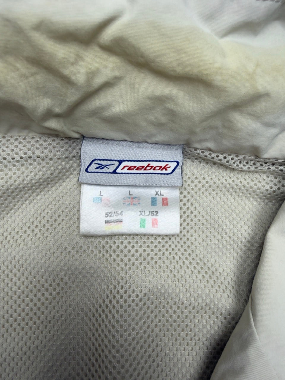 Reebok Windbreaker creme Etikett Größe XL