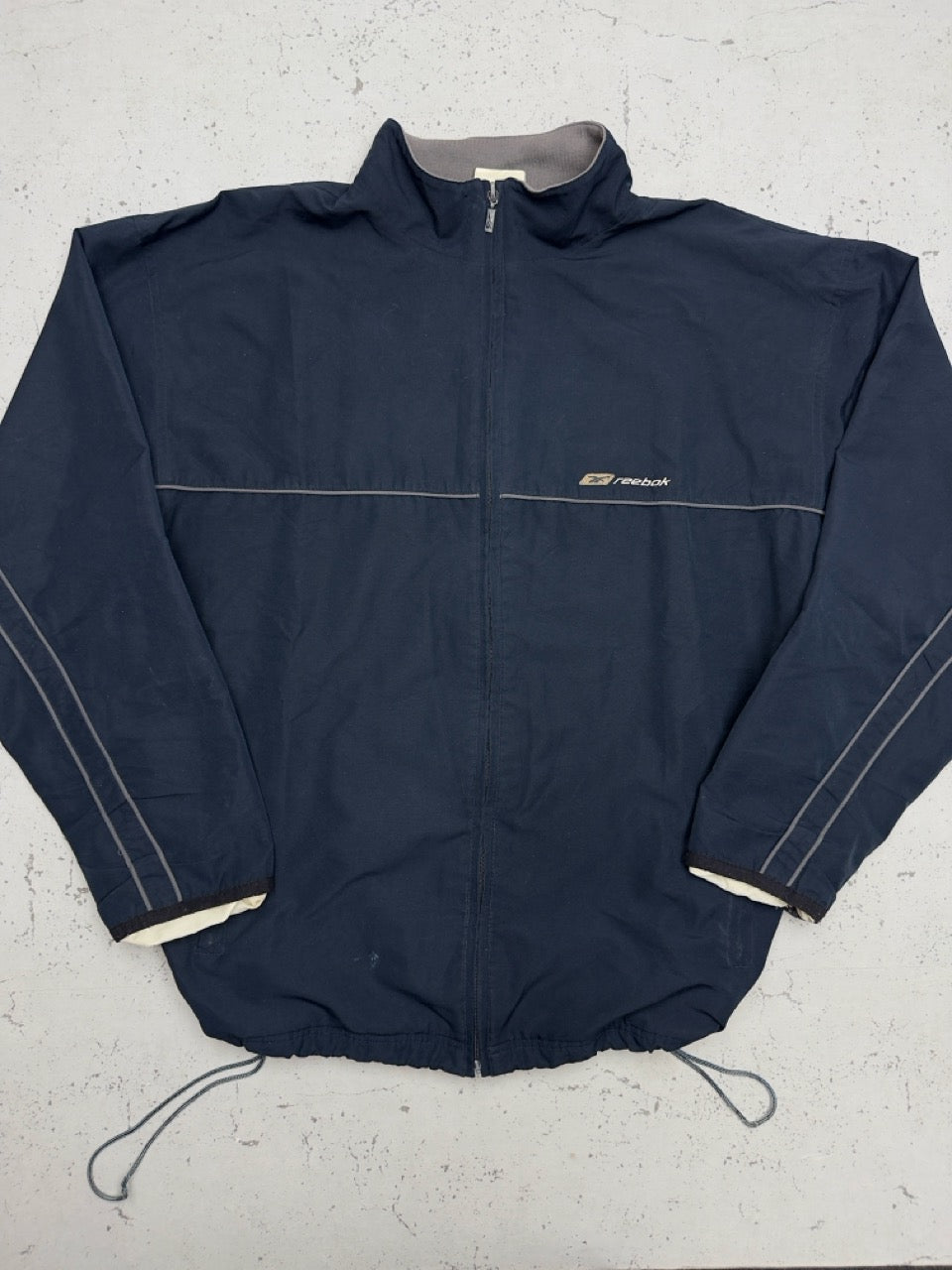 Reebok Jacke navy gold Vorderseite