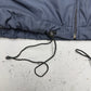 Nike Windbreaker Nylonjacke navy khaki Detail Kordelzug am Saum