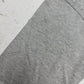 Nike Swoosh Sweatshirt grau meliert Zustand Detail Flecken am Ärmel