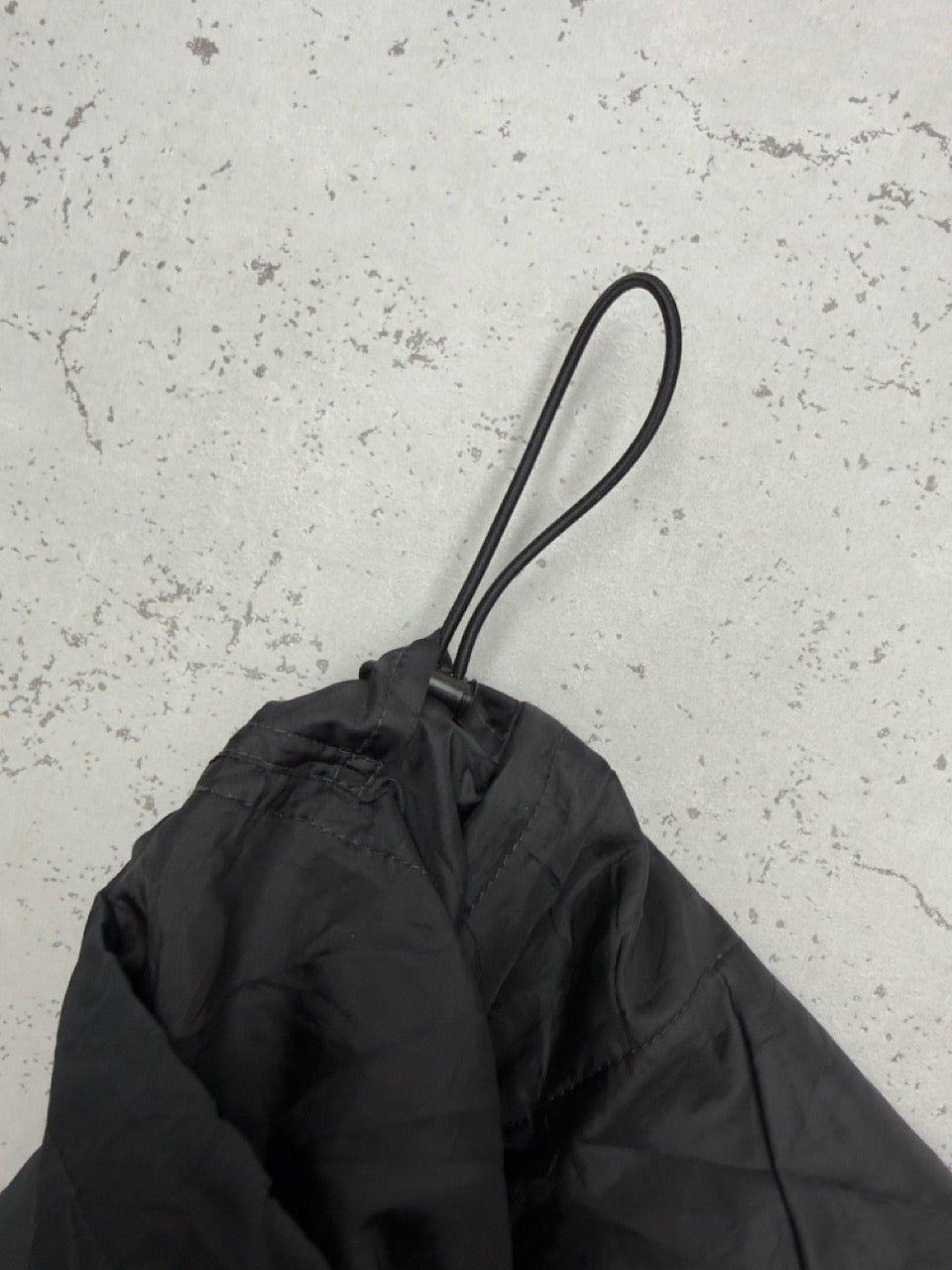 Nike Clima-Fit Kapuzenjacke schwarz Kordelzug Detail
