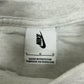 Nike Swoosh T-Shirt hellgrau meliert Etikett