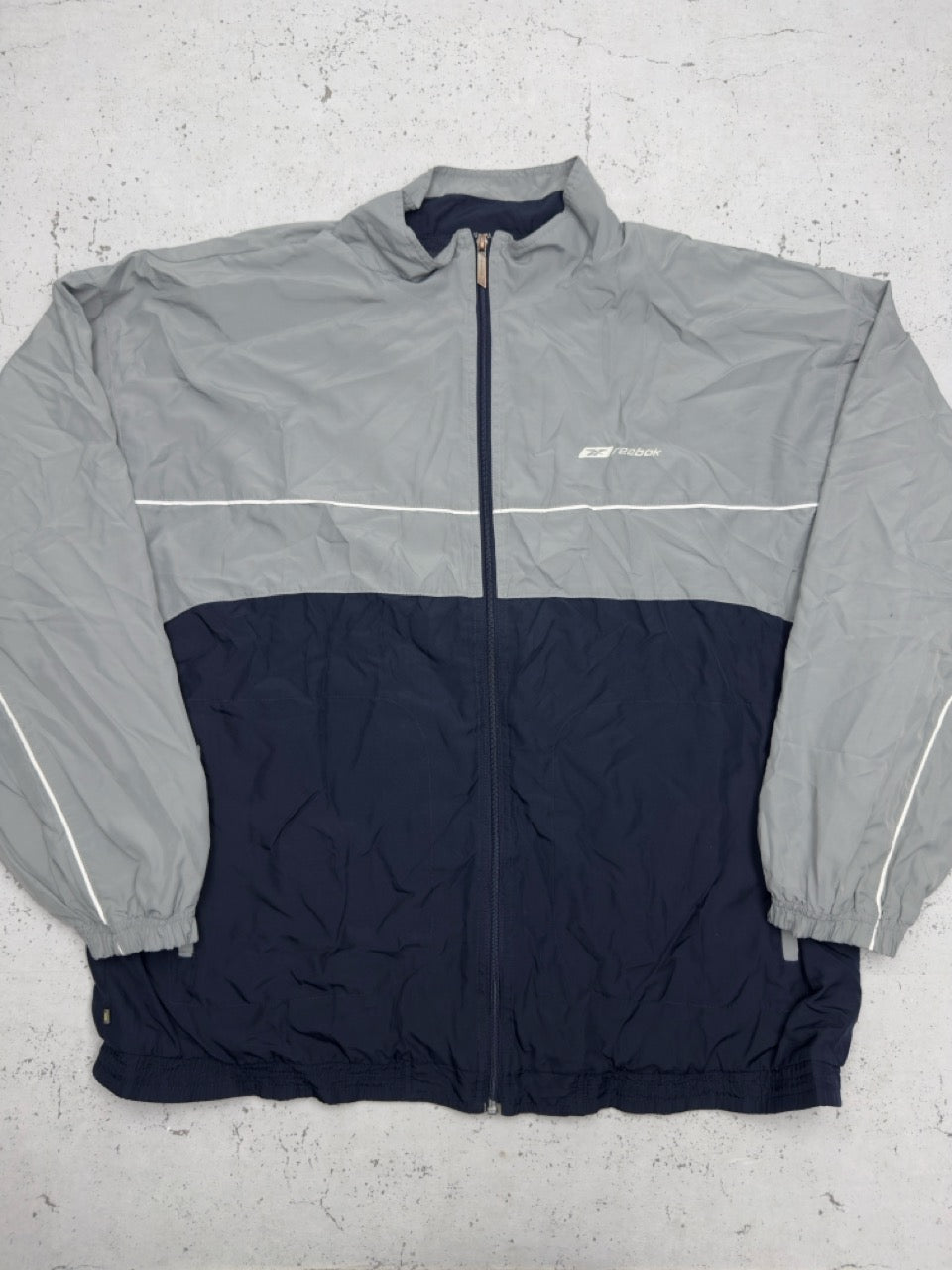 Reebok Trainingsjacke grau blau Vorderseite