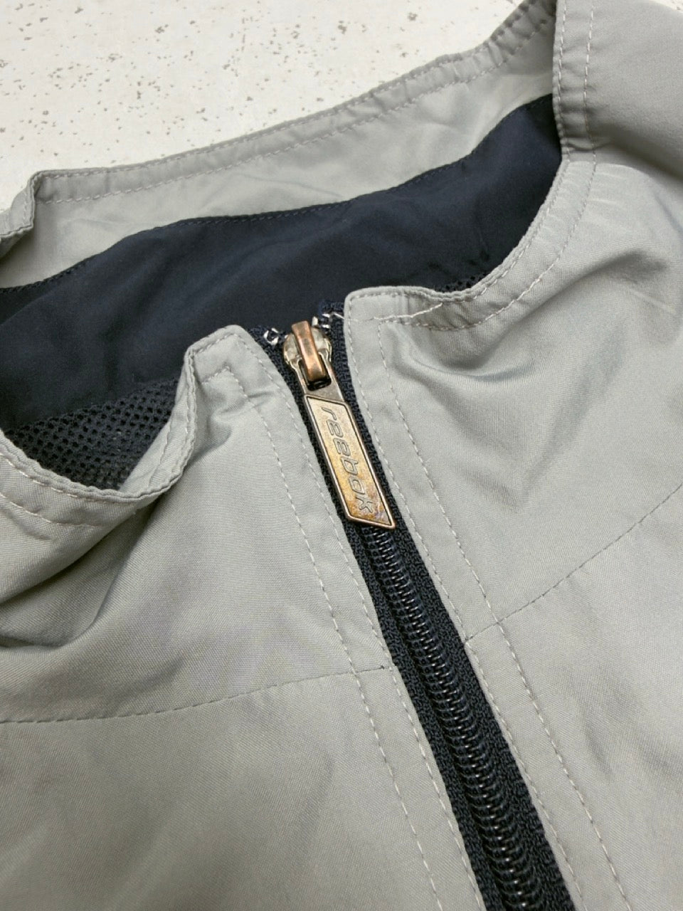Reebok Trainingsjacke grau blau Detail