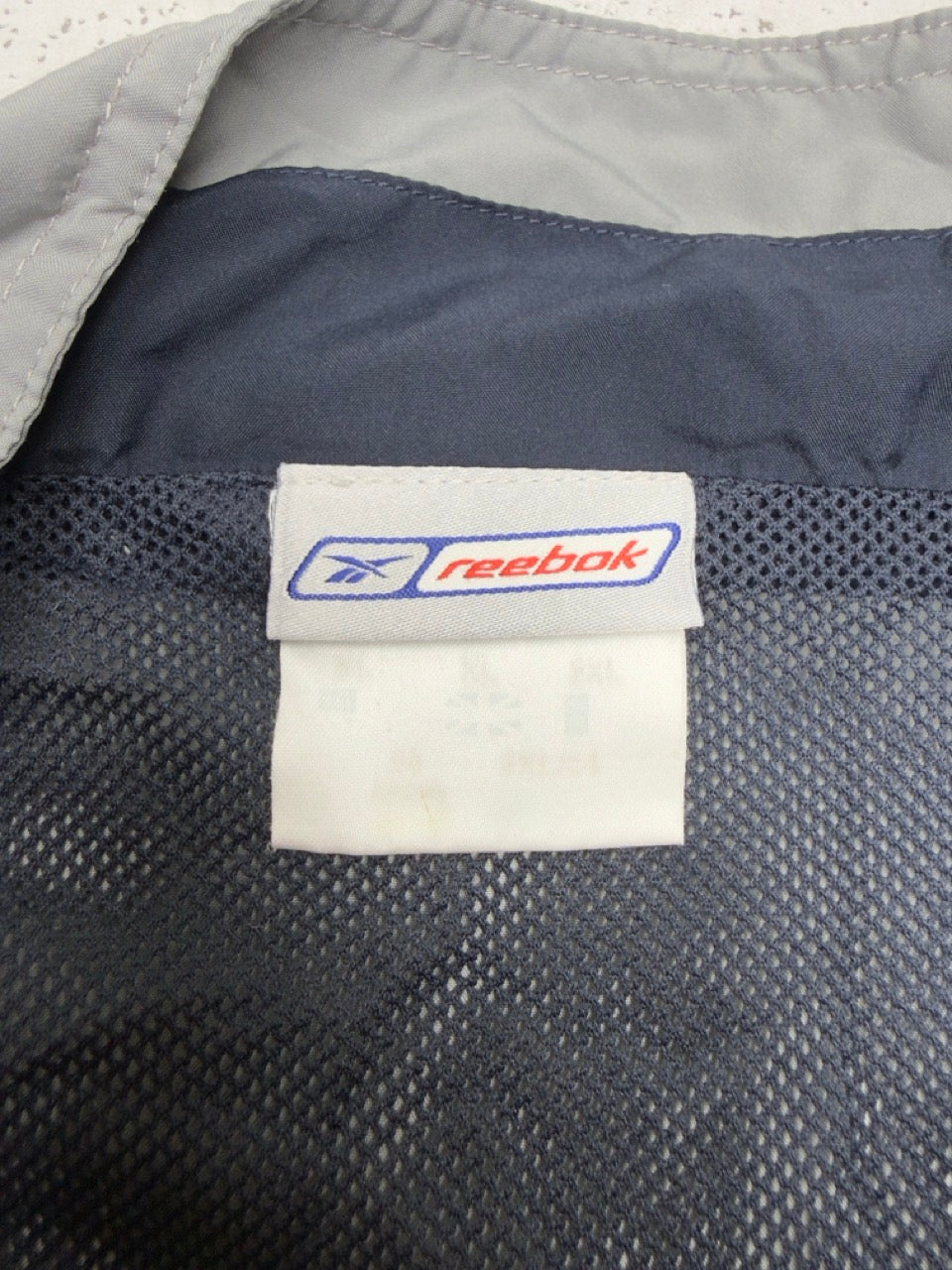 Reebok Trainingsjacke grau blau Detail