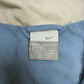 Nike Trainingsjacke blau Größen-Etikett