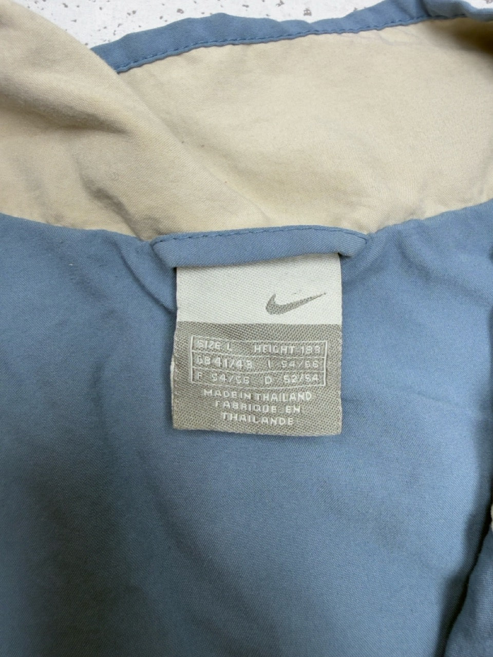 Nike Trainingsjacke blau Größen-Etikett