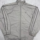 Nike Windbreaker beige schwarz Vorderseite