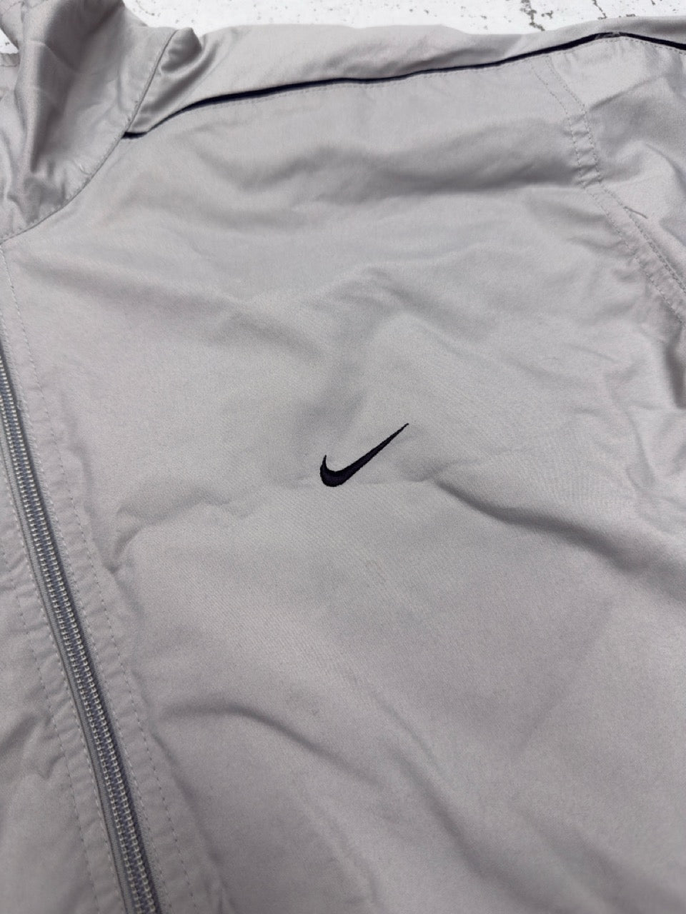 Nike Windbreaker beige schwarz Detail