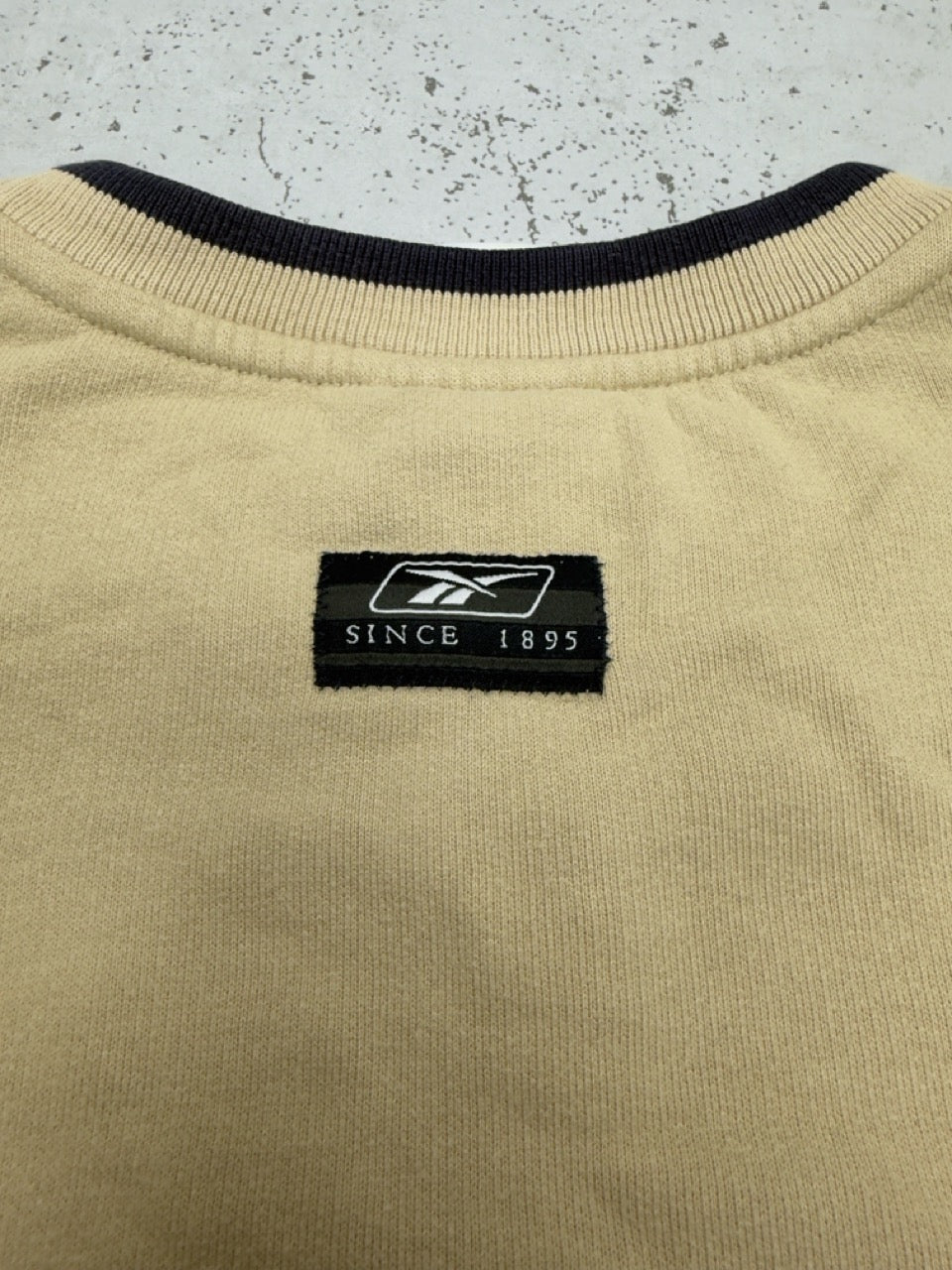 Reebok Sweatshirt beige blau Detail