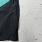 adidas Vintage Shell Pants in Schwarz mit Türkis, Größe M, Detail Reißverschluss am Saum
