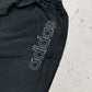 adidas Vintage Shell Pants in Schwarz mit Türkis, Größe M, Logo Nahaufnahme