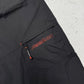 Reebok Vintage Outdoorhose in Schwarz, Größe XL, Logo am Bein Nahaufnahme
