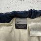 Nike Vintage Cargo Trackpants in Navy mit orangem Swoosh, Größe L, Etikett