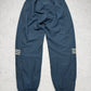 adidas Vintage Trackpants in Navy mit goldenem Logo, Größe L, Rückansicht