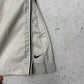 Nike Vintage Trackpants in Beige mit Navy Paspel, Größe S, Detail Reißverschluss am Bein