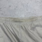 Nike Vintage Trackpants in Beige mit Navy Paspel, Größe S, Detail Bundnaht
