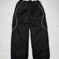 Nike Shox Vintage Trackpants in Schwarz, Größe L, Vorderansicht