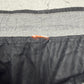 Nike Vintage Trackpants in Schwarz mit weißer Paspel, Größe M, kleine eingerissene Stelle im Netzfutter