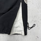 Nike Vintage Trackpants in Beige mit Logo-Streifen, Größe S, Detail Reißverschluss am Bein