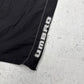 Umbro Vintage Trackpants in Schwarz, Größe L, Logo-Schriftzug Nahaufnahme