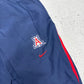 Nike Team Vintage Trackpants Arizona Wildcats in Navy, Größe L, Arizona-Logo und Swoosh Nahaufnahme