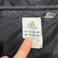 adidas Vintage Trackpants in Schwarz, Markenetikett mit Größe M