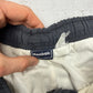 Reebok Vintage Trackpants in Anthrazit, Bund mit Kordelzug und Markenetikett