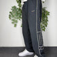 Reebok Vintage Trackpants in Anthrazit, Größe L, getragen am Model