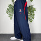 Nike Team Vintage Trackpants Arizona Wildcats in Navy, Größe L, am Model getragen