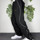 Nike Shox Vintage Trackpants in Schwarz, Größe L, am Model getragen