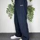 Reebok Vintage Trackpants in Dunkelblau, Groesse M, getragen am Model