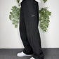 Reebok Vintage Trackpants in Schwarz, Größe L, am Model getragen