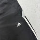 Adidas Vintage Trackpants in Schwarz, Logo-Detail