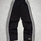 Adidas Snap Pants Vintage Trackpants in Schwarz, Größe L, Vorderseite