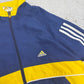 Adidas Vintage Windbreaker in Navy Gelb, Logo-Closeup