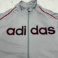 Adidas Vintage Trainingsjacke in Grau Rot, Logo-Closeup