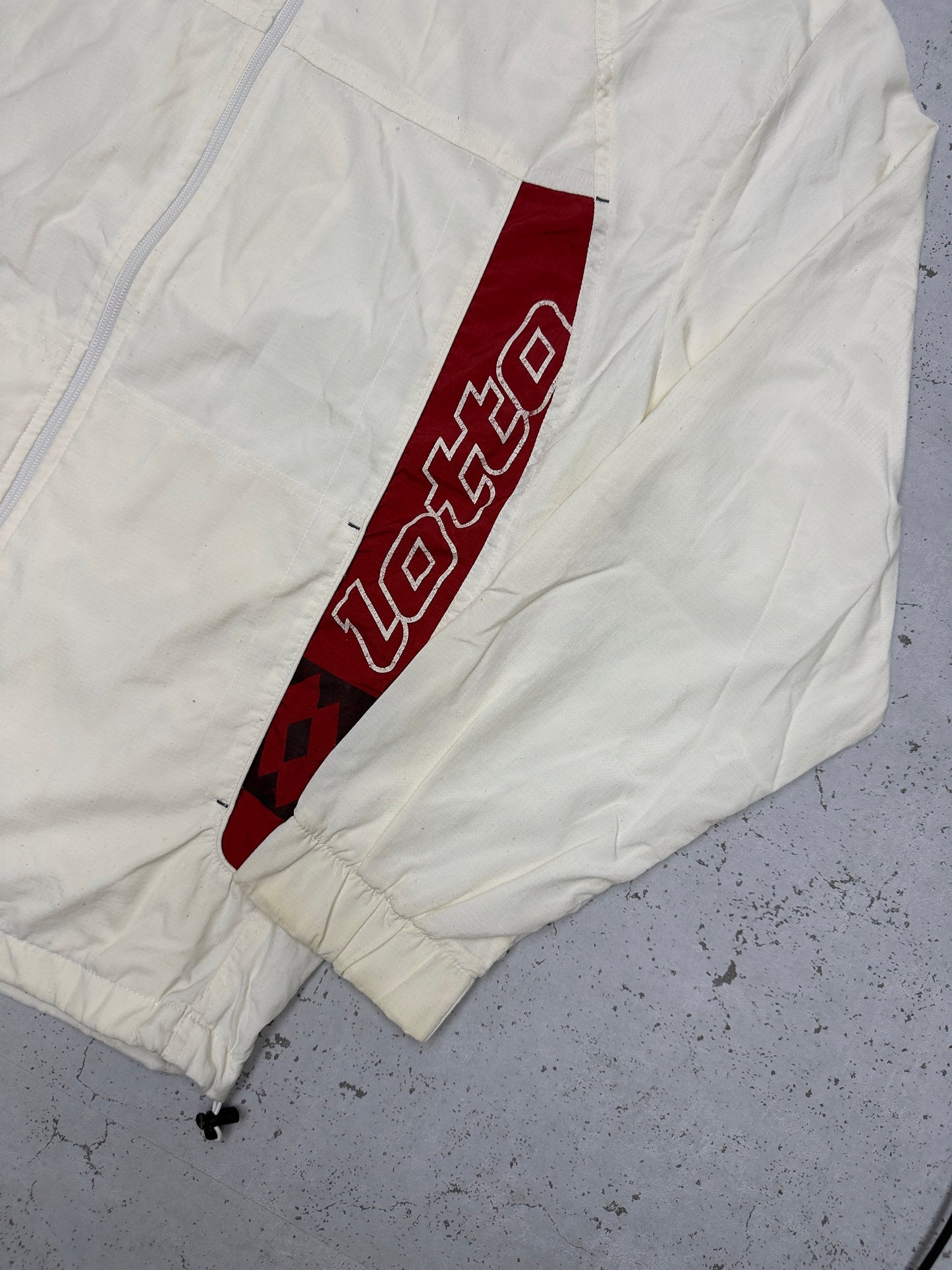 Lotto Trainingsjacke Creme Ärmel Detail