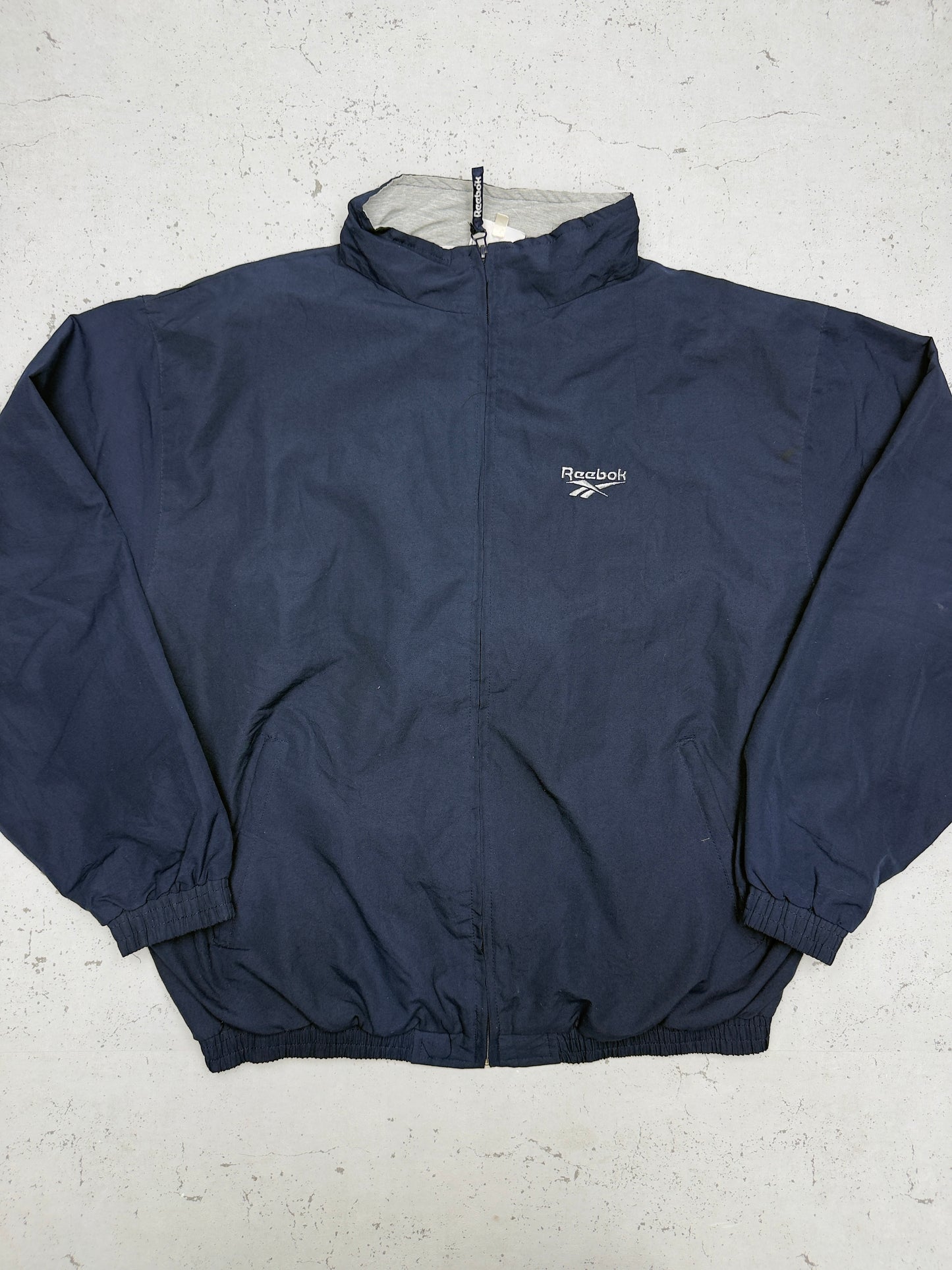 Reebok Vintage Trainingsjacke Navy – Frontansicht flach