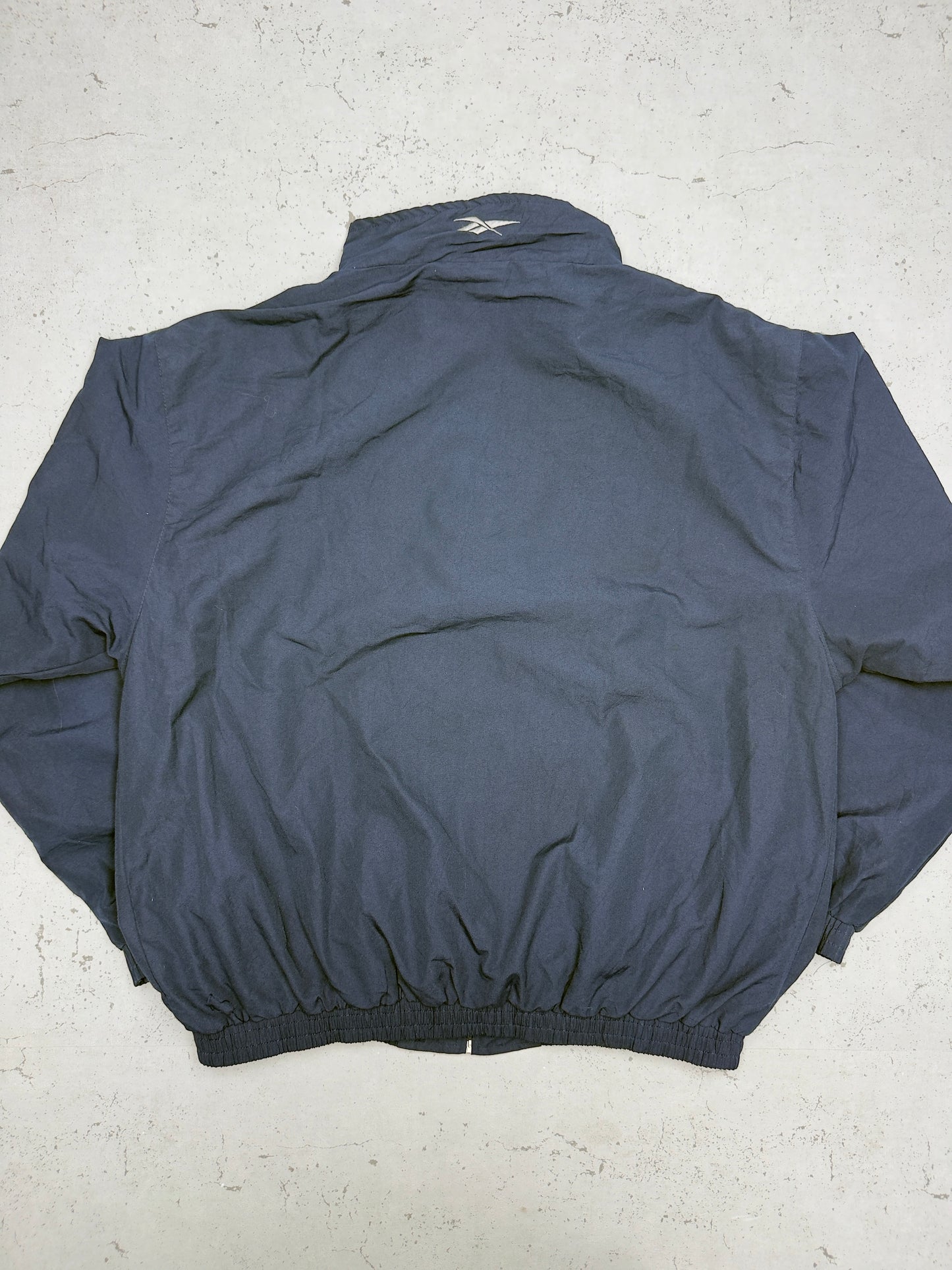 Reebok Vintage Trainingsjacke Navy – Rückenansicht flach