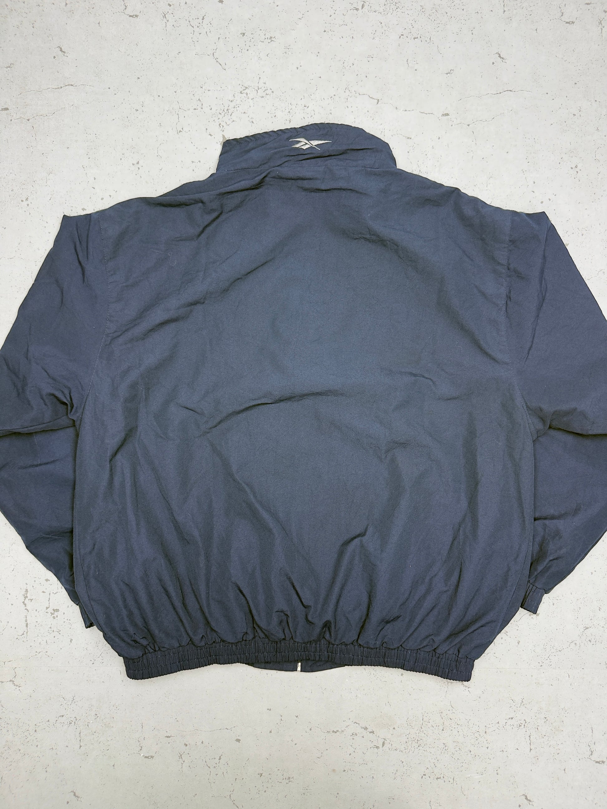 Reebok Vintage Trainingsjacke Navy – Rückenansicht flach